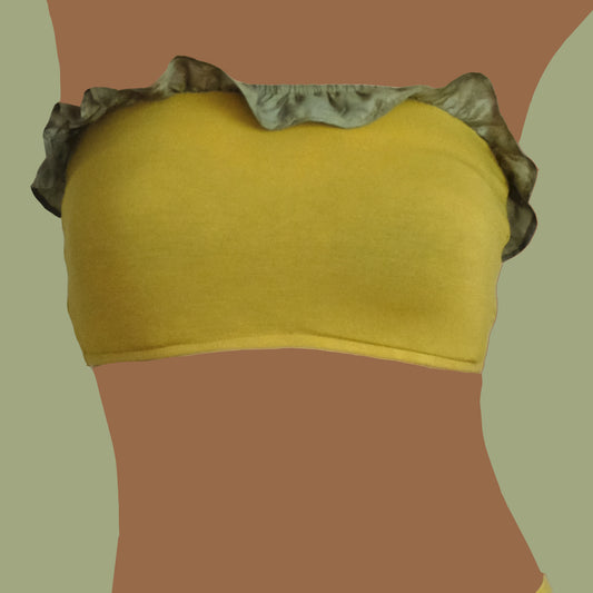 Top a fascia in jersey di viscosa con balza in seta.